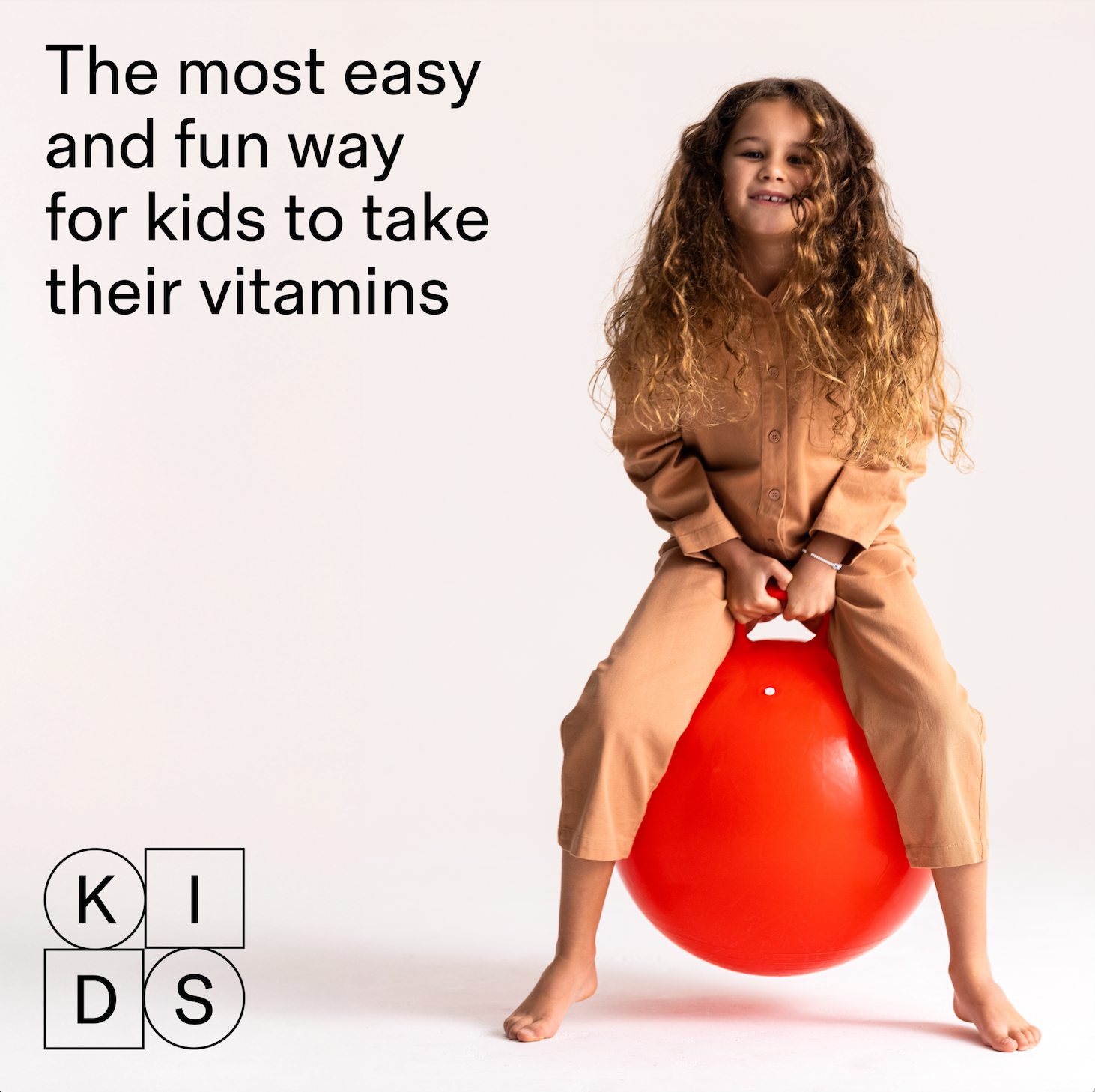 The most easy and fun way for kids to take their vitamines with happy healthy kid in red balloon
